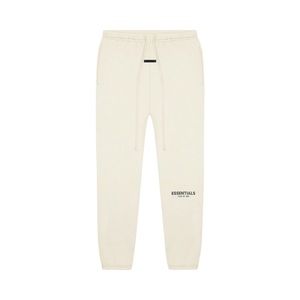 Fear of god ESSENTIALS sweatpants in “cream”